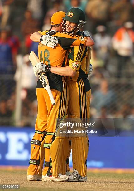 Michael Hussey and Adam Voges of Australia celebrate winning the match and the seven match series 4-2 at the conclusion of the sixth One Day...