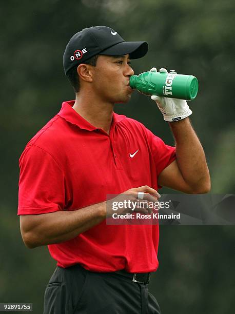 Tiger Woods of the USA takes a drink during the final round of the WGC - HSBC Champions at Sheshan International Golf Club on November 8, 2009 in...