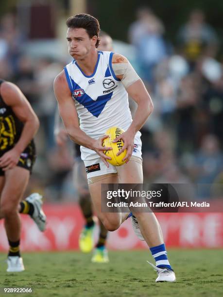 Luke Davies-Uniacke of the Kangaroos in action during the AFL 2018 JLT Community Series match between the Richmond Tigers and the North Melbourne...