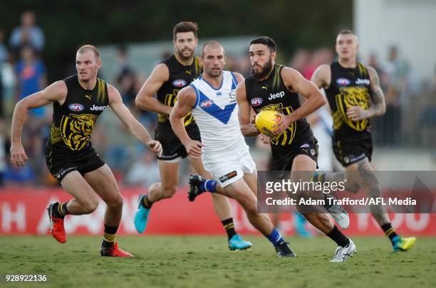 Shane Edwards of the Tigers in action during the AFL 2018 JLT Community Series match between the Richmond Tigers and the North Melbourne Kangaroos at...