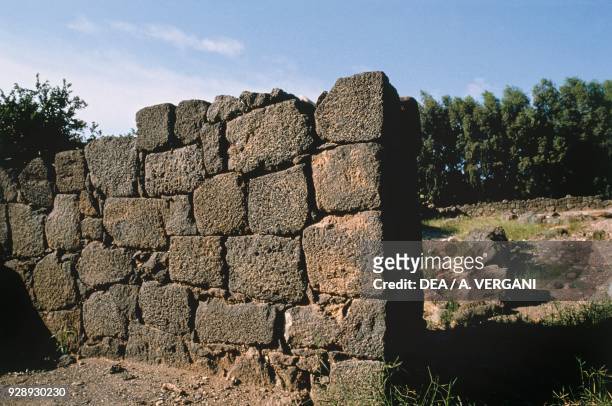 Ruins of the wall of the ancient city of Naxos, Giardini-Naxos, Sicily, Italy. Magna Graecia civilization, 8th-5th century BC.