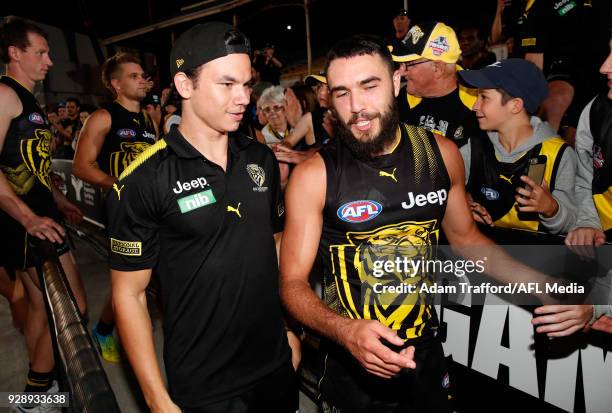 Daniel Rioli of the Tigers chats to Shane Edwards of the Tigers during the AFL 2018 JLT Community Series match between the Richmond Tigers and the...