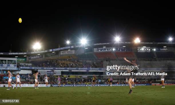 Callum Moore of the Tigers kicks the ball during the AFL 2018 JLT Community Series match between the Richmond Tigers and the North Melbourne...