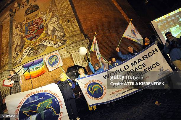 Members of the international team of 'The World March for Peace and Nonviolence' arrive at the Buda Palace in the Hungarian capital Budapest on...
