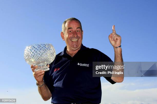 Sam Torrance of Scotland poses with the John Jacobs Trophy, an award for winning the 2009 Order of Merit, after the final round of the OKI Castellon...