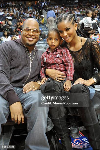 Music producer Tricky Stewart, Kiyan Anthony, son of Carmelo Anthony of the Denver Nuggets, and recording artist Ciara attend the Denver Nuggets game...