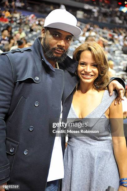 Producer Polow da Don and radio personality Elle Duncan attend the Denver Nuggets game against the Atlanta Hawks at Philips Arena on November 7, 2009...