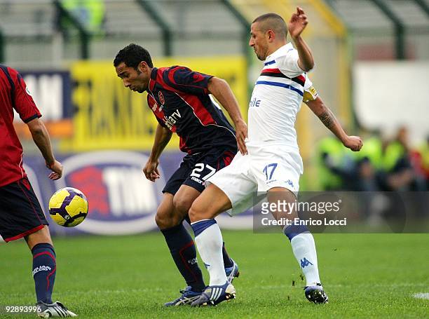 Neves Capucho Jeda of Cagliari competes for the ball with Angelo Palombo of UC Sampdoria during the Serie A match between Cagliari and UC Sampdoria...