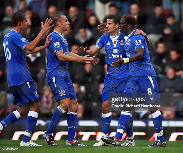 Louis Saha of Everton celebrates scoring the first goal of the game with Tim Cahill, Johnny Heitinga and Jack Rodwell during the Barclays Premier...