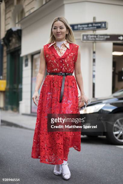 Tina Leung is seen on the street attending Jourden during Paris Women's Fashion Week A/W 2018 wearing a red lace dress on March 6, 2018 in Paris,...