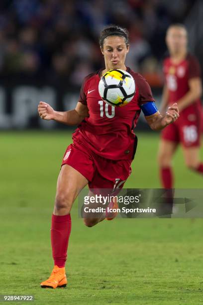 United States midfielder Carli Lloyd takes the ball off her chest during the second half of the SheBelieves Cup match between USA and England on...