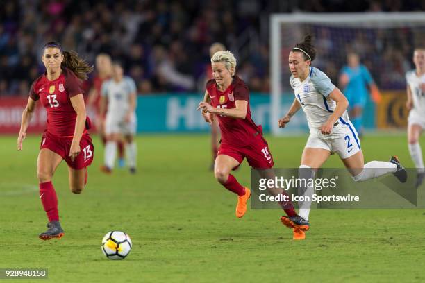 United States forward Megan Rapinoe sprints away from England defender Lucy Bronze during the second half of the SheBelieves Cup match between USA...