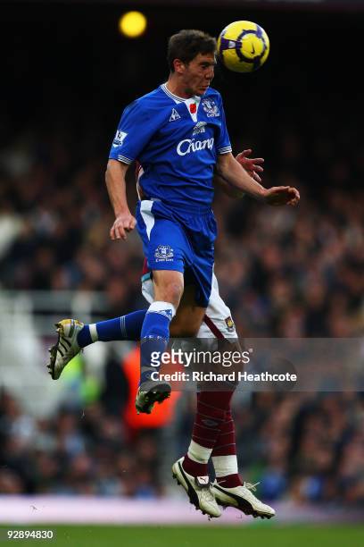 Jack Collison of West Ham and Dan Gosling of Everton go for the header during the Barclays Premier League match between West Ham United and Everton...