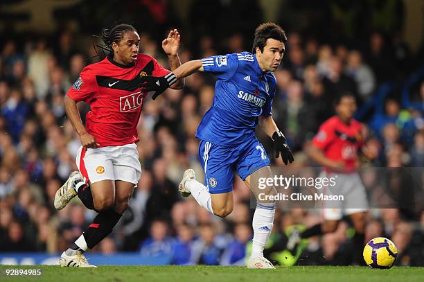 Deco of Chelsea is pursued by Anderson of Manchester United during the Barclays Premier League match between Chelsea and Manchester United at...