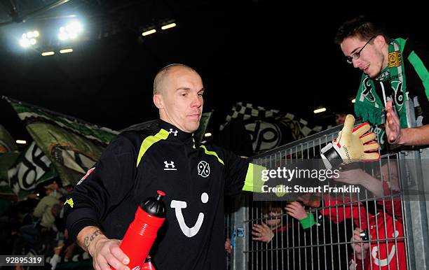 Robert Enke of Hannover 96 celebrates with fans at the end of the Bundesliga match between Hannover 96 and Hamburger SV at AWD-Arena on November 8,...