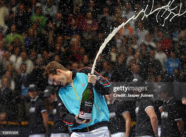 Andy Murray of Great Britain sprays champagne celebrating his win over Mikhail Youzhny of Russia in the final of the ATP 500 World Tour Valencia Open...