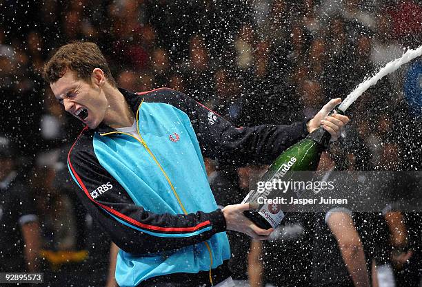 Andy Murray of Great Britain sprays champagne celebrating his win over Mikhail Youzhny of Russia in the final of the ATP 500 World Tour Valencia Open...