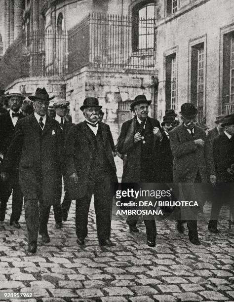 Thomas Woodrow Wilson , Georges Benjamin Clemenceau , Arthur James Balfour and Sidney Sonnino in Versailles to sign the peace treaty with Germany,...
