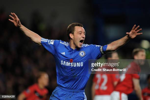John Terry of Chelsea celebrates after scoring the opening goal during the Barclays Premier League match between Chelsea and Manchester United at...