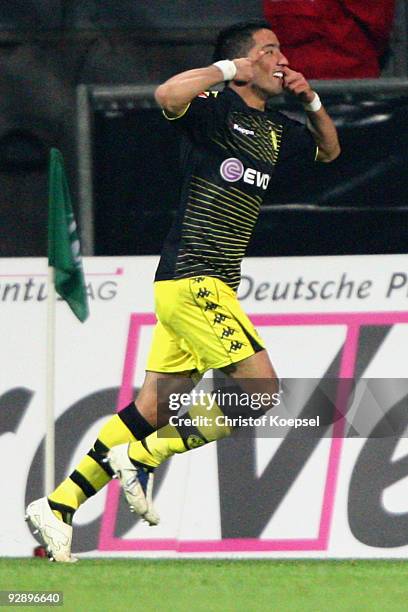 Lucas Barrios of Dortmund celebrates a goal during the Bundesliga match between SV Werder Bremen and Borussia Dortmund at the Weser Stadium on...