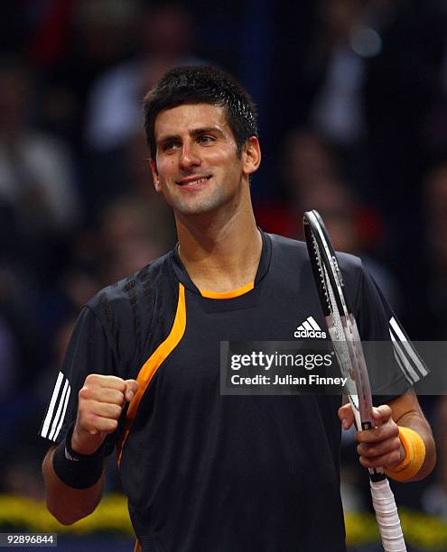 Novak Djokovic of Serbia celebrates at match point after defeating Roger Federer of Switzerland in the final during Day Seven of the Davidoff Swiss...