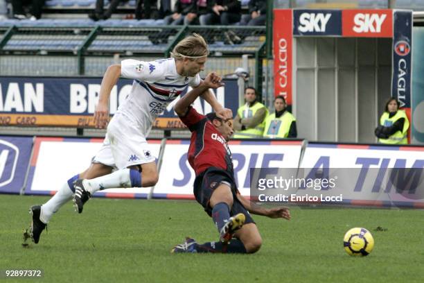 Neves Capucho Jeda of Cagliari and Marius Stankevicius of Sampdoria compete for the ball during the Serie A match between Cagliari and UC Sampdoria...
