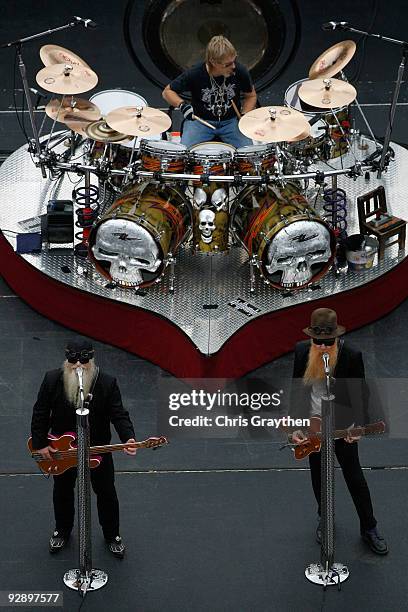 Musicians Dusty Hill, Frank Beard, and Billy Gibbons of ZZ Top perform at the NASCAR Sprint Cup Series Dickies 500 at Texas Motor Speedway on...