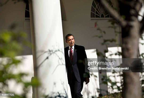 President Barack Obama walks through the colonnade to the West Wing of the White House to make a statement to the media November 8, 2009 in...