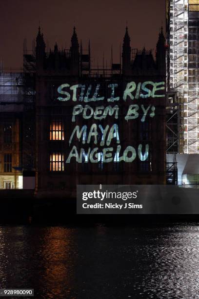 Messages are projected onto the Houses of Parliament to mark the start of International Women's Day on March 8, 2018 in London, England.