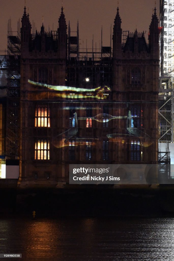 International Women's Day Messages Projected Onto UK Parliament