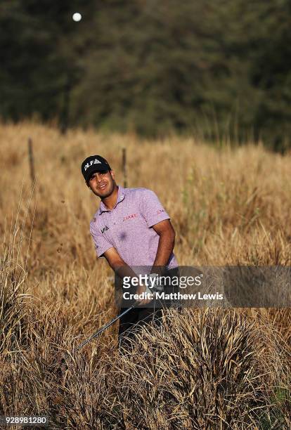Shubhankar Sharma of India plays out of the rough on the 11th hole during day one of the Hero Indian Open at Dlf Golf and Country Club on March 8,...