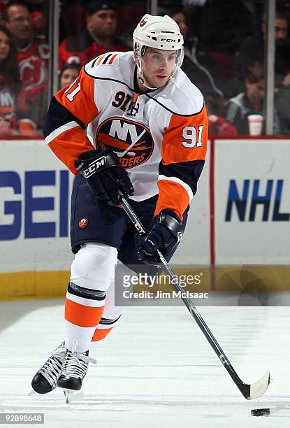 John Tavares of the New York Islanders skates against the New Jersey Devils during their NHL game at the Prudential Center on November 6, 2009 in...