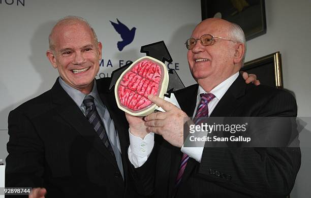 Bill Roedy , Chairman and Chief Executive of MTV Networks International, awards former Soviet President Mikhail Gorbachev the the Free Your Mind...