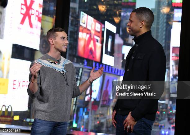 Winter Olympics bronze in the team event, figure skater Adam Rippon talks to Extra's NYC host AJ Calloway at "Extra" at Renaissance New York Times...