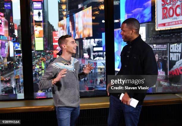 Winter Olympics bronze in the team event, figure skater Adam Rippon talks to Extra's NYC host AJ Calloway at "Extra" at Renaissance New York Times...