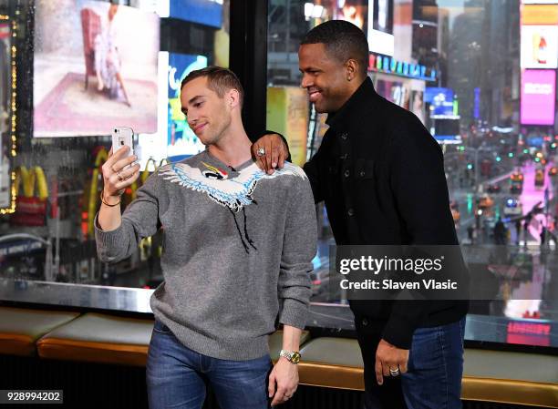 Winter Olympics bronze in the team event, figure skater Adam Rippon talks to Extra's NYC host AJ Calloway at "Extra" at Renaissance New York Times...