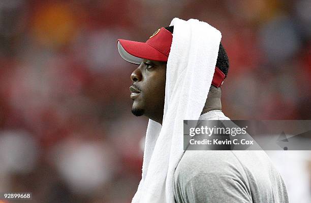 Clinton Portis of the Washington Redskins watches from the sidelines after suffering a concussion against the Atlanta Falcons at Georgia Dome on...