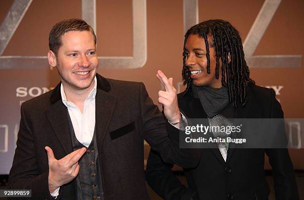 Marco Kreuzpaintner and friend Kelnner Franca attend the '2012' Germany premiere on November 08, 2009 in Berlin, Germany.