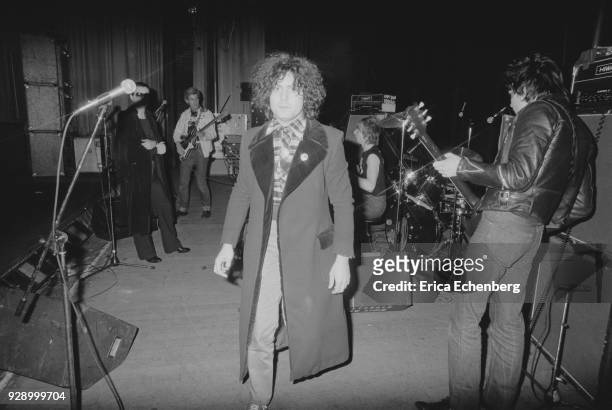 Marc Bolan on stage with punk band The Damned during his 'Dandy In The Underworld' United Kingdom tour, 1977. L-R Dave Vanian, Captain Sensible, Marc...