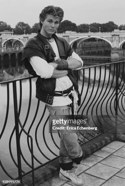 Portrait of Morten Harket of A-Ha by the River Thames during the recording of the band's first album, Twickenham, London, 1984.