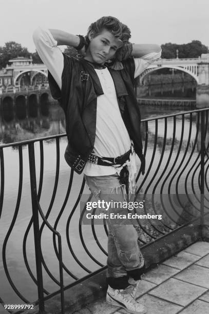 Portrait of Morten Harket of A-Ha by the River Thames during the recording of the band's first album, Twickenham, London, 1984.