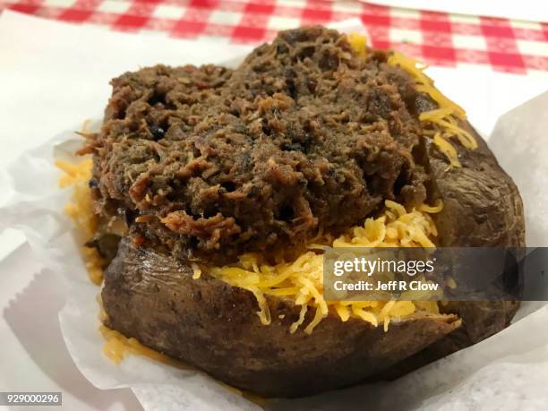 stuffed baked potato with barbecue - stuffed potato stock pictures, royalty-free photos & images