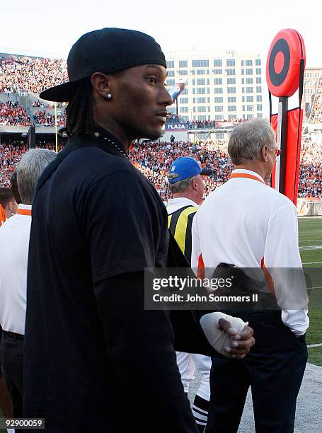 Chris Henry of the Cincinnati Bengals watches the second half of play from the side lines after breaking his arm in the first half against the...