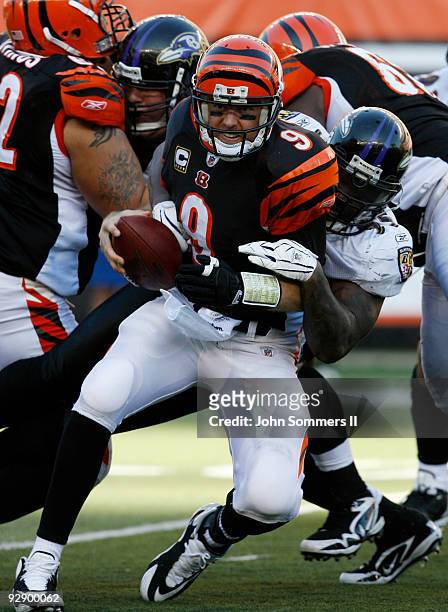 Carson Palmer of the Cincinnati Bengals is sacked by Terrell Suggs of the Baltimore Ravens in their NFL game at Paul Brown Stadium November 8, 2009...