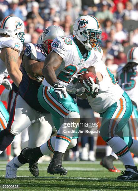 Ronnie Brown of the Miami Dolphons gains yards against the New England Patriots at Gillette Stadium on November 8, 2009 in Foxboro, Massachusetts.