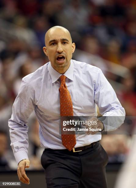 Head coach Shaka Smart of the Texas Longhorns reacts from the bench during the first round of the Big 12 Basketball Tournament against the Iowa State...