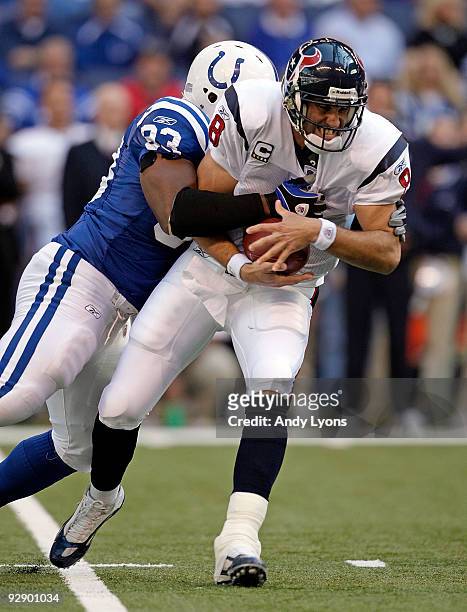 Dwight Freeney of the Indianapolis Colts sacks Matt Schaub of the Houston Texans during the NFL game at Lucas Oil Stadium on November 8, 2009 in...