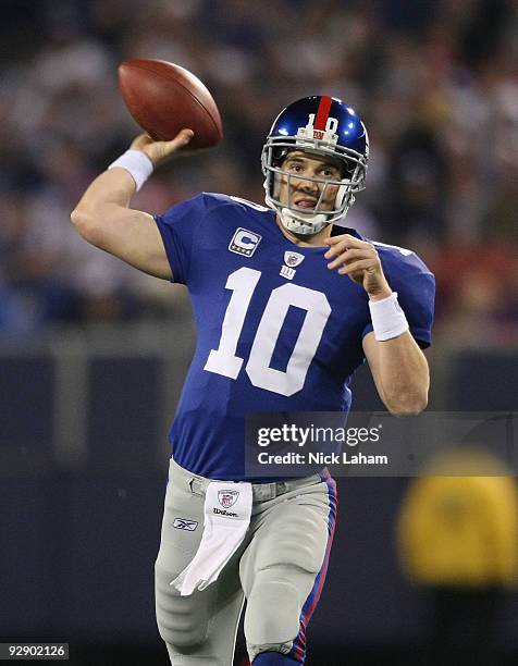 Eli Manning of the New York Giants passes against the San Diego Chargers at Giants Stadium on November 8, 2009 in East Rutherford, New Jersey.