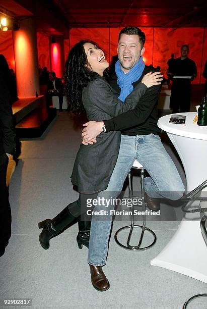Anastasia Zampounidis and Carsten Thamm attend the afterparty of the Europe premiere of 2012 at subway station Potsdamer Platz, line U3 on November...