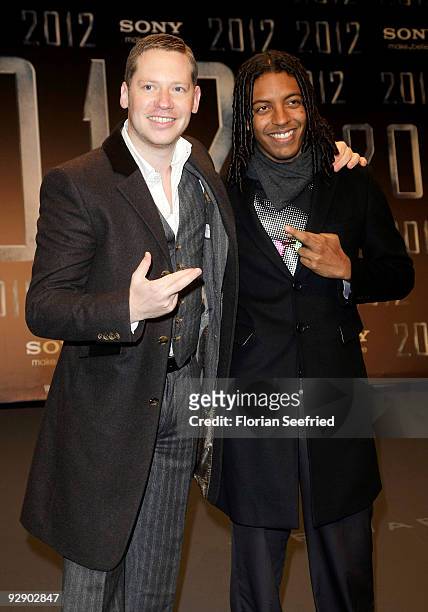 Director Marco Kreuzpaintner and Kelnner Franca attend the Europe premiere of 2012 at the Sony Center CineStar on November 8, 2009 in Berlin, Germany.